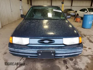 1996 Ford Escort z VIN 1FASP11J0TW123967, wystawiony jako Copart lot #52859835 z przebiegiem 164 693 mil mil oraz Szkoda całkowita • Salvage title. Historia ofert i sprzedaży dostępna na DreamBid. Obrazek 5.