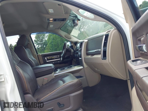 2012 Ram 2500 Laramie Longhorn with VIN 3C6UD5GL1CG121386, listed as a IAAI auction lot 42119700 with 207,173 mi miles and . Bid and sale history available at DreamBid. Image 5.