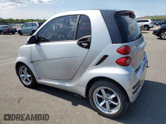 2011 Smart fortwo Pure with VIN WMEEJ3BA6BK449704, listed as a Copart auction lot 69454434 with 23,581 mi miles and Clean title. Bid and sale history available at DreamBid. Image 2.