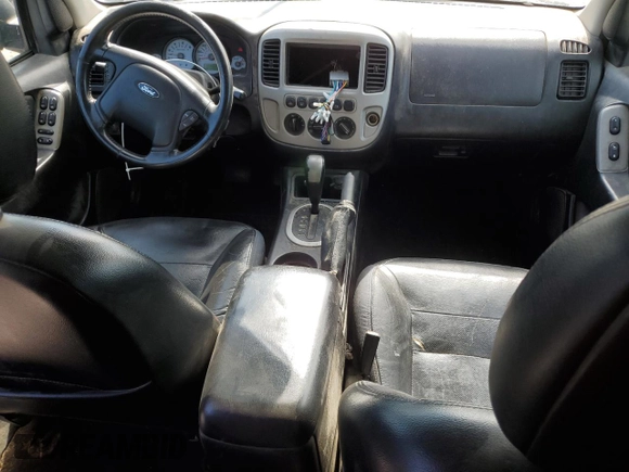2005 Ford Escape Limited with VIN 1FMYU041X5KC72704, listed as a Copart auction lot 57819655 with 179,469 mi miles and Salvage title. Bid and sale history available at DreamBid. Image 8.