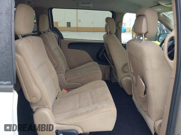 2014 Dodge Grand Caravan SXT z VIN 2C4RDGCGXER322705, wystawiony jako IAAI lot #42450791 z przebiegiem 147 113 mil mil oraz . Historia ofert i sprzedaży dostępna na DreamBid. Obrazek 8.