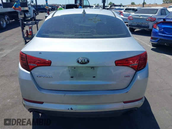 2013 Kia Optima LX z VIN KNAGM4A7XD5389662, wystawiony jako IAAI lot #42265945 z przebiegiem 164 488 mil mil oraz . Historia ofert i sprzedaży dostępna na DreamBid. Obrazek 14.