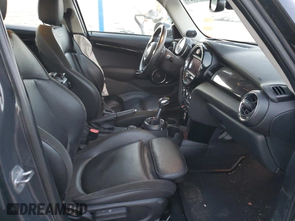 2019 MINI Hardtop 4 Door Cooper S z VIN WMWXU3C56K2H86633, wystawiony jako Copart lot #84340094 z przebiegiem 67 712 mil mil oraz Szkoda całkowita • Salvage title. Historia ofert i sprzedaży dostępna na DreamBid. Obrazek 7.
