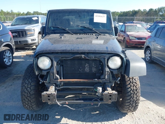 2012 Jeep Wrangler Sport with VIN 1C4AJWAG0CL247103, listed as a IAAI auction lot 42181637 with 159,003 mi miles and . Bid and sale history available at DreamBid. Image 13.