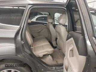 2015 Ford Escape Titanium with VIN 1FMCU9J96FUA43337, listed as a IAAI auction lot 41825328 with 149,639 mi miles and . Bid and sale history available at DreamBid. Image 8.
