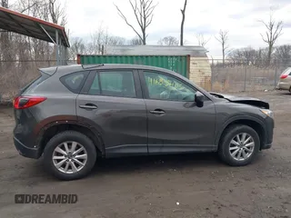 2016 Mazda CX-5 Sport with VIN JM3KE4BY8G0895209, listed as a IAAI auction lot 41688405 with 115,954 mi miles. Bid and sale history available at carsss.com. Image 13.