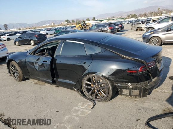 2022 Tesla Model S with VIN 5YJSA1E51NF482745, listed as a Copart auction lot 42562955 with 75,573 mi miles and Salvage Title. Bid and sale history available at DreamBid. Image 2.