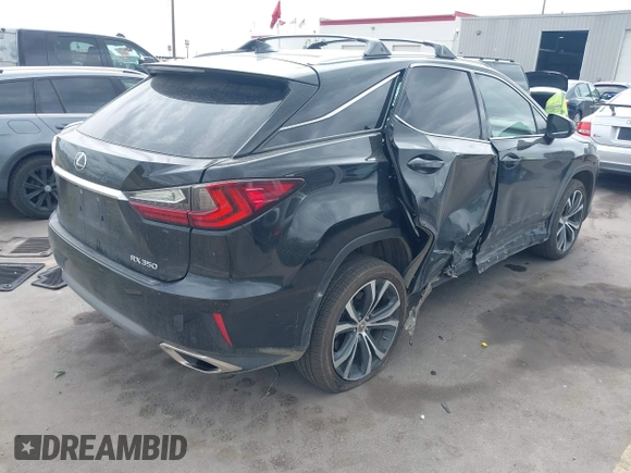2017 Lexus RX 350 with VIN 2T2BZMCA3HC090218, listed as a IAAI auction lot 42148051 with 94,954 mi miles and . Bid and sale history available at DreamBid. Image 4.