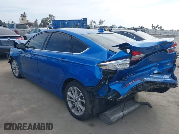 2020 Ford Fusion SE with VIN 3FA6P0LU3LR233370, listed as a IAAI auction lot 42221789 with 70,771 mi miles and . Bid and sale history available at DreamBid. Image 3.