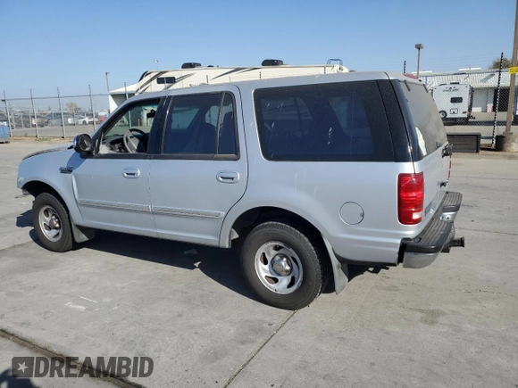 1997 Ford Expedition XLT z VIN 1FMEU1768VLA49281, wystawiony jako Copart lot #79895244 z przebiegiem 73 188 mil mil oraz Szkoda całkowita • Salvage title. Historia ofert i sprzedaży dostępna na DreamBid. Obrazek 2.