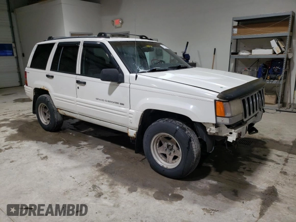 1998 Jeep Grand Cherokee Laredo with VIN 1J4GZ48SXWC183782, listed as a Copart auction lot 41700675 with 226,544 mi miles and Salvage Title. Bid and sale history available at carsss.com. Image 4.