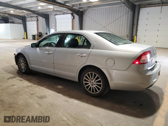 2006 Mercury Milan Premier with VIN 3MEHM08116R638785, listed as a Copart auction lot 64641395 with 127,178 mi miles and Salvage title. Bid and sale history available at DreamBid. Image 2.