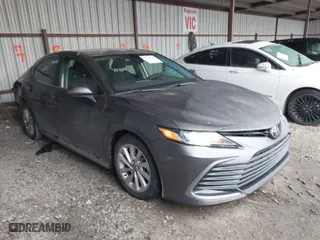 2023 Toyota Camry LE with VIN 4T1C11AK0PU764073, listed as a IAAI auction lot 41612188 with 39,126 mi miles. Bid and sale history available at carsss.com. Image 1.