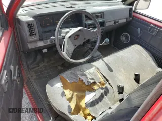 1986 Nissan Hardbody E z VIN JN6ND11SXGW022401, wystawiony jako Copart lot #51545335 z przebiegiem 187 680 mil mil oraz Czysty tytuł • Clean title. Historia ofert i sprzedaży dostępna na DreamBid. Obrazek 8.