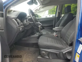 2020 Ford Ranger XL with VIN 1FTER4FHXLLA86940, listed as a Copart auction lot 58614045 with 77,249 mi miles and Salvage title. Bid and sale history available at DreamBid. Image 7.