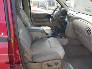 2004 Chevrolet TrailBlazer LS with VIN 1GNDT13S042190606, listed as a IAAI auction lot 42165900 with 298,141 mi miles. Bid and sale history available at carsss.com. Image 5.