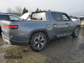2022 Rivian R1T Adventure z VIN 7FCTGAAA5NN014941, wystawiony jako Copart lot #43771755 z przebiegiem 43 410 mil mil oraz Szkody całkowita. Historia ofert i sprzedaży dostępna na DreamBid. Obrazek 3.