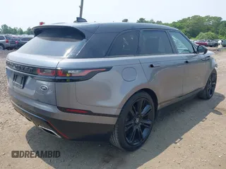 2020 Land Rover Range Rover Velar z VIN SALYM2EV8LA274870, wystawiony jako IAAI lot #42479938 z przebiegiem 43 039 mil mil oraz . Historia ofert i sprzedaży dostępna na DreamBid. Obrazek 4.