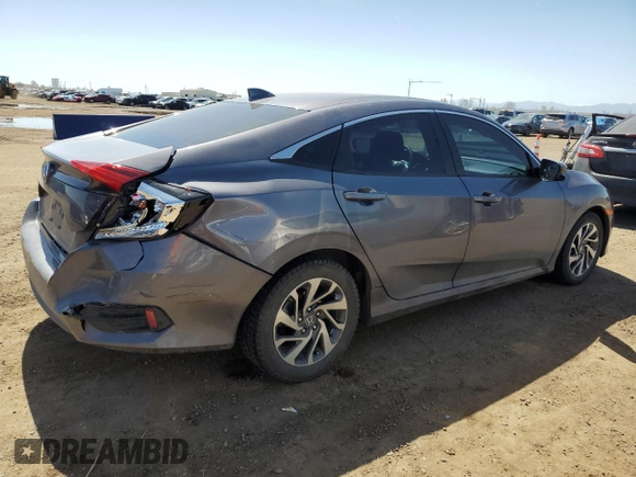 2018 Honda Civic EX with VIN 19XFC2F70JE043957, listed as a Copart auction lot 52217275 with 87,175 mi miles and Salvage Title. Bid and sale history available at DreamBid. Image 3.