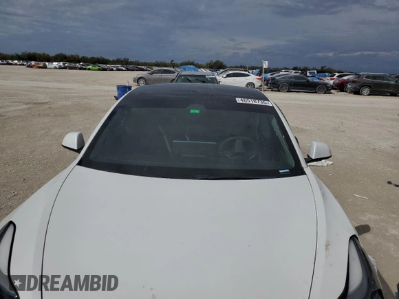 2023 Tesla Model 3 z VIN 5YJ3E1EA3PF501496, wystawiony jako Copart lot #46518735 z przebiegiem Nie podano mil oraz Nie do naprawy • Non repairable. Historia ofert i sprzedaży dostępna na DreamBid. Obrazek 11.