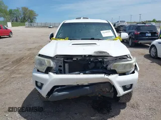 2015 Toyota Tacoma with VIN 3TMLU4EN2FM193142, listed as a IAAI auction lot 42189553 with 70,480 mi miles and . Bid and sale history available at DreamBid. Image 13.