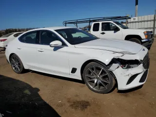 2023 Genesis G70 2.0T with VIN KMTG34TA0PU116515, listed as a Copart auction lot 70511154 with 11,942 mi miles and Salvage Title. Bid and sale history available at carsss.com. Image 4.