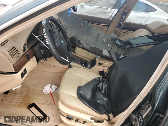 1998 BMW 7 Series 740il with VIN WBAGJ8329WDM24296, listed as a Copart auction lot 73581634 with 247,498 mi miles and Salvage Title. Bid and sale history available at carsss.com. Image 7.