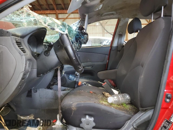 2009 Kia Rio LX with VIN KNADE243696572877, listed as a Copart auction lot 66075394 with 0 mi miles and Non Repairable. Bid and sale history available at carsss.com. Image 7.