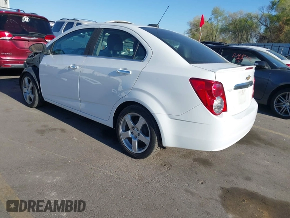 2016 Chevrolet Sonic LTZ z VIN 1G1JE5SB0G4144421, wystawiony jako IAAI lot #42020434 z przebiegiem 120 114 mil mil oraz . Historia ofert i sprzedaży dostępna na DreamBid. Obrazek 3.