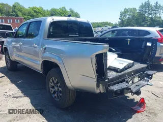 2023 Toyota Tacoma SR with VIN 3TYCZ5AN2PT141576, listed as a IAAI auction lot 42492127 with 43,431 mi miles and . Bid and sale history available at DreamBid. Image 3.