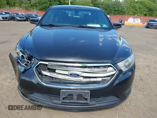 2015 Ford Taurus SEL with VIN 1FAHP2E88FG181055, listed as a IAAI auction lot 42307640 with 104,702 mi miles and . Bid and sale history available at DreamBid. Image 11.