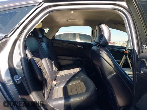 2018 Ford Fusion SE z VIN 3FA6P0H70JR191384, wystawiony jako IAAI lot #41340319 z przebiegiem 89 581 mil mil oraz . Historia ofert i sprzedaży dostępna na DreamBid. Obrazek 8.