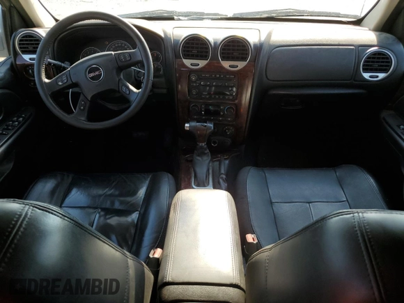 2005 GMC Envoy SLT with VIN 1GKDT13S852185958, listed as a Copart auction lot 68736194 with 225,398 mi miles and Salvage Title. Bid and sale history available at DreamBid. Image 8.