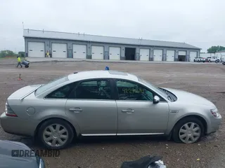 2008 Ford Taurus Limited z VIN 1FAHP25WX8G185318, wystawiony jako IAAI lot #42298692 z przebiegiem 129 103 mil mil oraz . Historia ofert i sprzedaży dostępna na DreamBid. Obrazek 13.