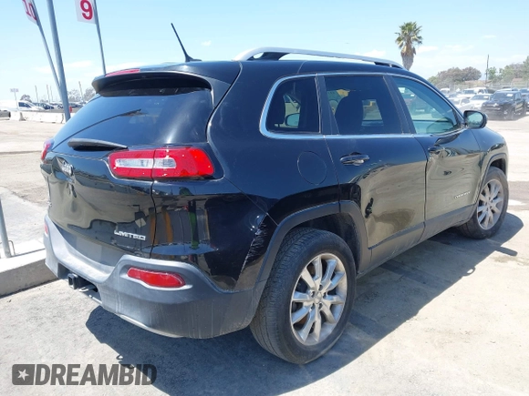 2014 Jeep Cherokee Limited with VIN 1C4PJMDB9EW210180, listed as a IAAI auction lot 41302037 with 75,177 mi miles and . Bid and sale history available at DreamBid. Image 4.