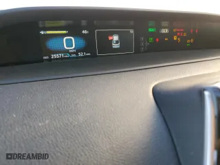 2021 Toyota Prius L Eco with VIN JTDKAMFU2M3127974, listed as a Copart auction lot 76284914 with 25,571 mi miles and Salvage Title. Bid and sale history available at carsss.com. Image 9.