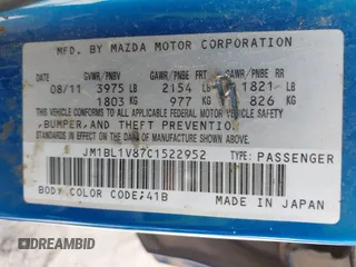 2012 Mazda 3 i Touring z VIN JM1BL1V87C1522952, wystawiony jako IAAI lot #42265128 z przebiegiem 138 182 mil mil oraz . Historia ofert i sprzedaży dostępna na DreamBid. Obrazek 9.
