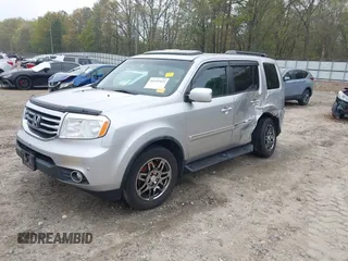 2014 Honda Pilot Touring with VIN 5FNYF4H91EB011934, listed as a IAAI auction lot 41929415 with 227,343 mi miles and . Bid and sale history available at DreamBid. Image 17.