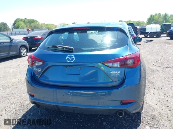 2018 Mazda 3 Touring z VIN 3MZBN1L38JM185142, wystawiony jako IAAI lot #42004450 z przebiegiem 172 096 mil mil oraz . Historia ofert i sprzedaży dostępna na DreamBid. Obrazek 16.