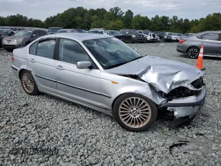 2003 BMW 3 Series 330i with VIN WBAEV53423KM30265, listed as a Copart auction lot 70214374 with 152,171 mi miles and Salvage Title. Bid and sale history available at carsss.com. Image 4.