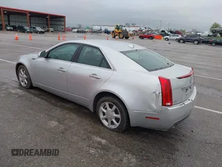 2009 Cadillac CTS AWD w/1SA with VIN 1G6DG577990155465, listed as a IAAI auction lot 41947102 with 1 mi miles. Bid and sale history available at carsss.com. Image 3.