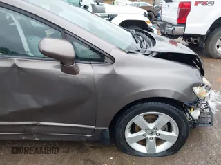 2010 Honda Civic LX-S z VIN 19XFA1F60AE070633, wystawiony jako IAAI lot #42205266 z przebiegiem 217 467 mil mil oraz . Historia ofert i sprzedaży dostępna na DreamBid. Obrazek 6.