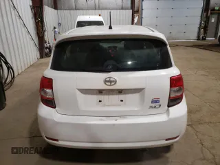 2014 Scion xD with VIN JTKKUPB48E1046627, listed as a Copart auction lot 61498995 with 63,452 mi miles and Salvage title. Bid and sale history available at DreamBid. Image 6.