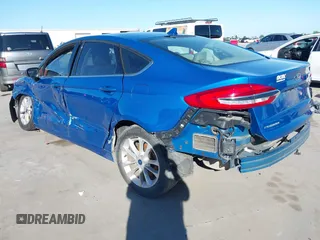 2020 Ford Fusion SE with VIN 3FA6P0H77LR153539, listed as a IAAI auction lot 42054318 with 103,820 mi miles and . Bid and sale history available at DreamBid. Image 3.