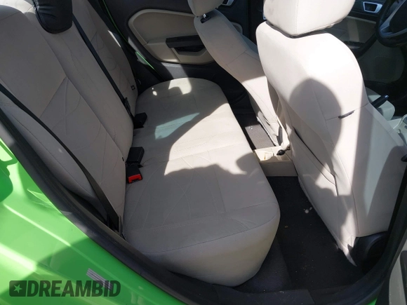 2014 Ford Fiesta SE with VIN 3FADP4BJ8EM226260, listed as a IAAI auction lot 41833140 with 188,917 mi miles and . Bid and sale history available at DreamBid. Image 8.