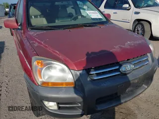 2005 Kia Sportage LX with VIN KNDJF723457078461, listed as a IAAI auction lot 41948080 with 104,330 mi miles and . Bid and sale history available at carsss.com. Image 6.