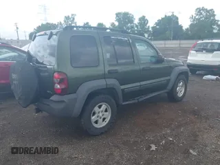 2006 Jeep Liberty Sport with VIN 1J4GL48K76W288408, listed as a IAAI auction lot 39990700 with 215,716 mi miles. Bid and sale history available at carsss.com. Image 4.