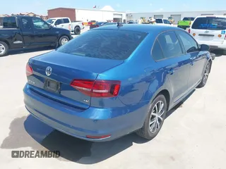 2016 Volkswagen Jetta Sedan 1.4T SE with VIN 3VWD67AJ8GM218112, listed as a IAAI auction lot 42061478 with 84,860 mi miles. Bid and sale history available at carsss.com. Image 4.