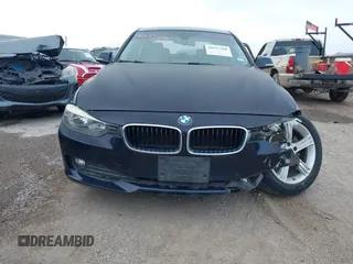2015 BMW 3 Series 320i with VIN WBA3B1C53FK138310, listed as a IAAI auction lot 41677208 with 57,891 mi miles. Bid and sale history available at carsss.com. Image 12.