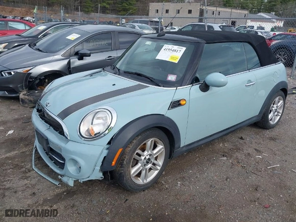 2013 MINI Cooper Convertible with VIN WMWZN3C53DT135427, listed as a IAAI auction lot 41954817 with 57,029 mi miles. Bid and sale history available at carsss.com. Image 2.